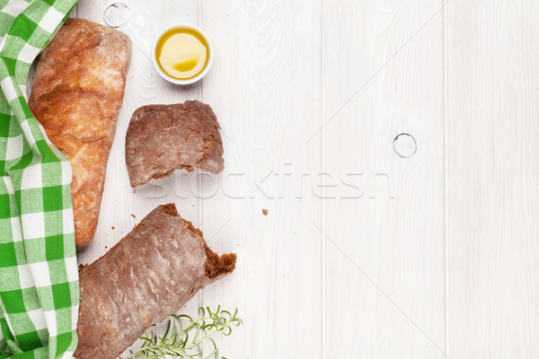 Ciabatta with olive oil and rosemary Stock photo © karandaev