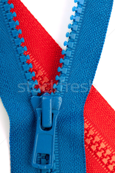 Blue and red zippers closeup Stock photo © karandaev
