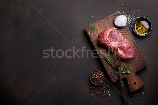 Nyers bifsztek főzés hozzávalók felső kilátás Stock fotó © karandaev