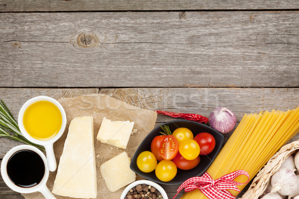 Parmesan cheese, pasta, tomatoes, vinegar, olive oil, herbs and  Stock photo © karandaev