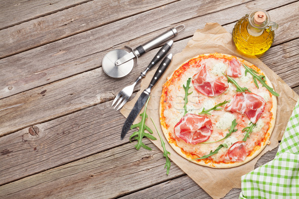 Pizza prosciutto mozzarella ahşap masa üst görmek Stok fotoğraf © karandaev