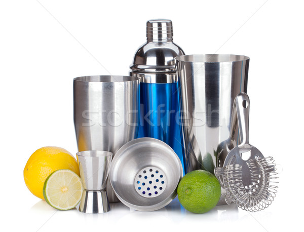 Cocktail shaker, strainer, measuring cup, drinking straws and ci Stock photo © karandaev