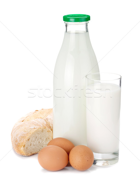 Milk bottle, glass, bread and eggs Stock photo © karandaev