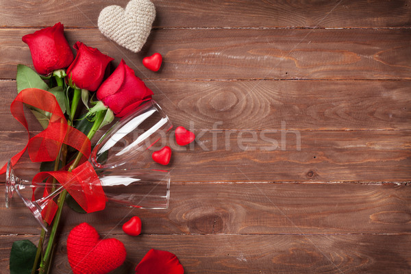 Red roses, hearts and champagne Stock photo © karandaev