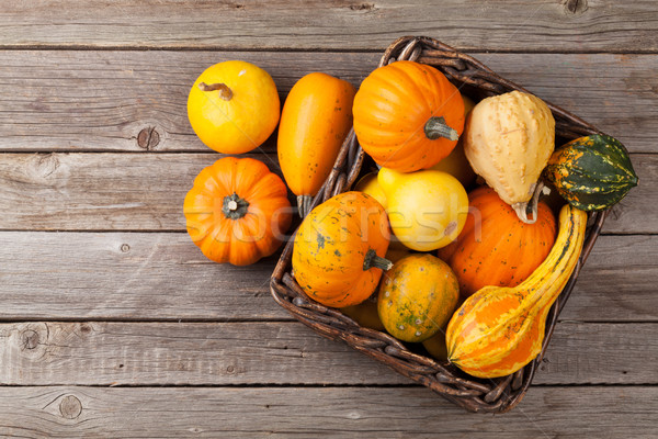 Stock photo: Autumn pumpkins on wooden table