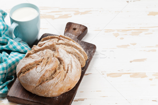 Homemade crusty bread and milk Stock photo © karandaev