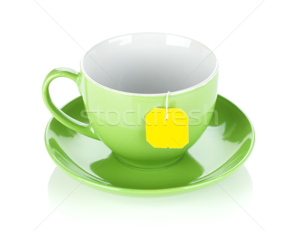 Green tea cup and teabag Stock photo © karandaev