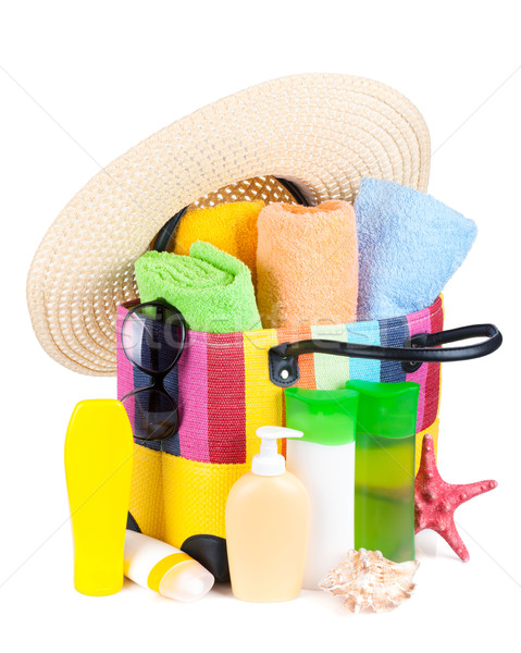 Stock photo: Bag with towels, sunglasses, hat and beach items