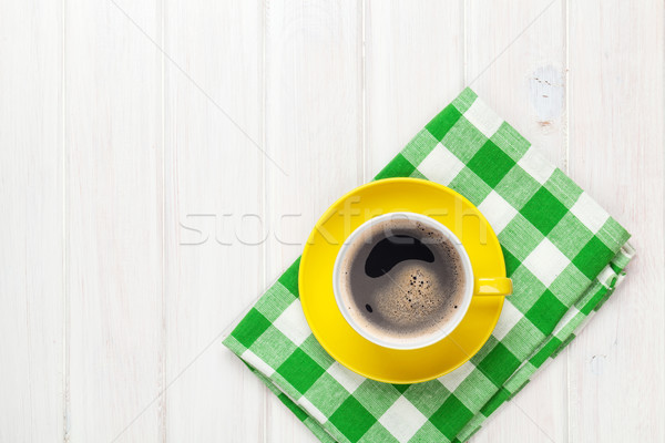 Stock photo: Coffee cup on white wooden table