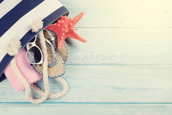 Beach accessories on wooden background Stock photo © karandaev