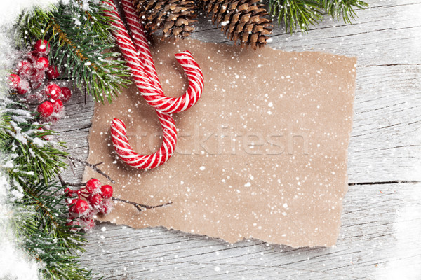 Noël bonbons canne neige table en bois [[stock_photo]] © karandaev