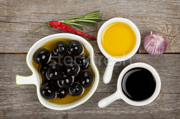 Olives, olive oil and vinegar with spices Stock photo © karandaev