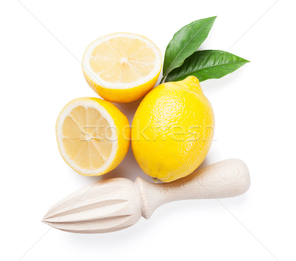 Fresh ripe lemons and juicer Stock photo © karandaev