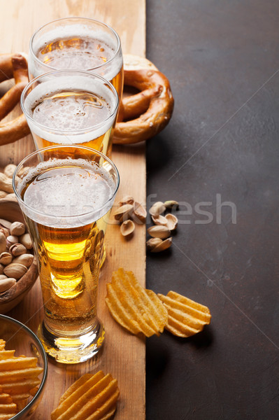 Stock photo: Lager beer and snacks