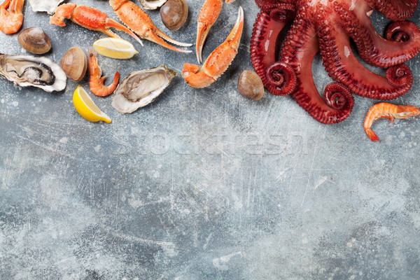 Seafood. Octopus, oysters, lobster, shrimps Stock photo © karandaev
