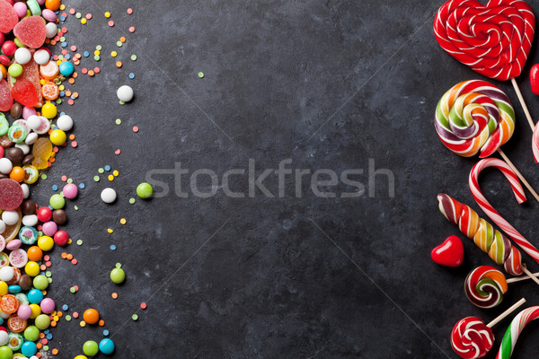Stock photo: Colorful candies, jelly and marmalade over stone