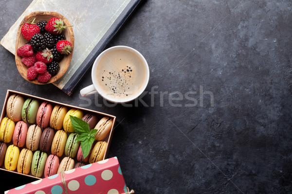 Colorful macaroons, berries and coffee Stock photo © karandaev