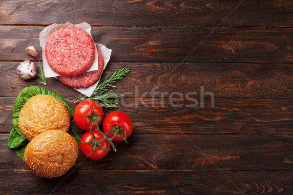 Raw minced beef meat and ingredients for burgers Stock photo © karandaev