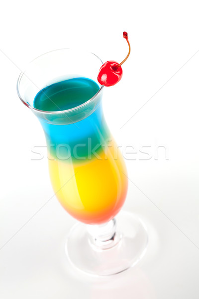 Layered tropical cocktail with maraschino Stock photo © karandaev