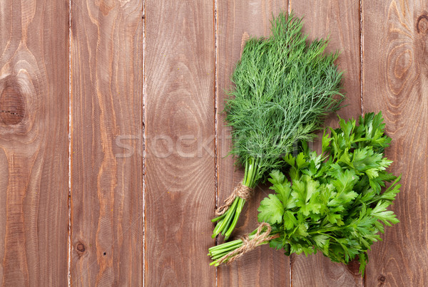 Fraîches jardin persil herbes table en bois haut [[stock_photo]] © karandaev