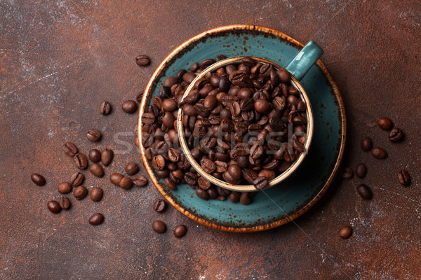 Coffee cup with roasted beans Stock photo © karandaev