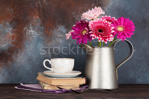 Gerbera flowers bouquet and coffee cup Stock photo © karandaev