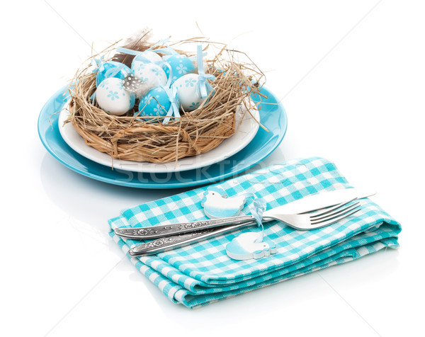 Easter eggs nest on plate with silverware Stock photo © karandaev
