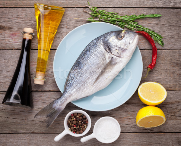 Friss hal főzés fűszer fűszerek fa asztal Stock fotó © karandaev