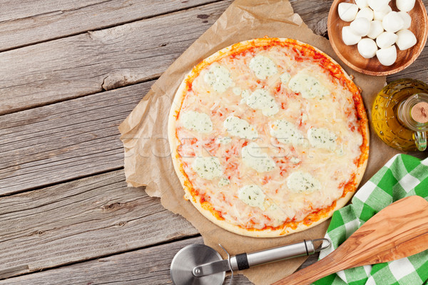 Quattro fromaggi pizza Stock photo © karandaev