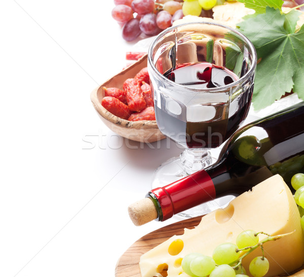 Red wine, grape, cheese, bread and sausages Stock photo © karandaev