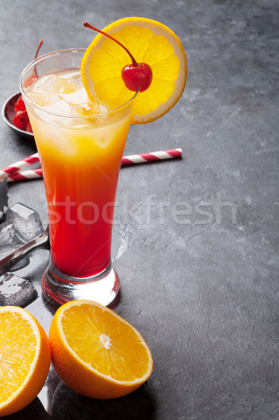 Tequila napfelkelte koktél sötét kő asztal Stock fotó © karandaev