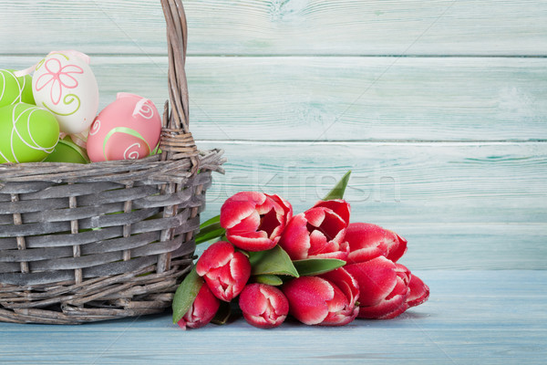 Red tulip flowers and easter eggs Stock photo © karandaev