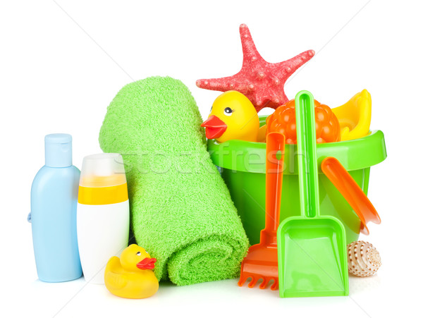 Beach baby toys, towels and bottles Stock photo © karandaev
