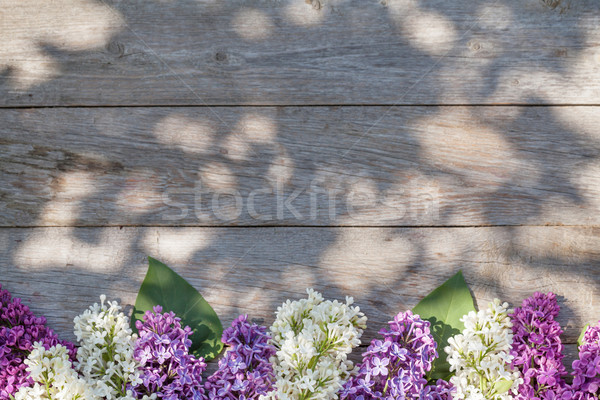 Colorful lilac flowers on garden table Stock photo © karandaev