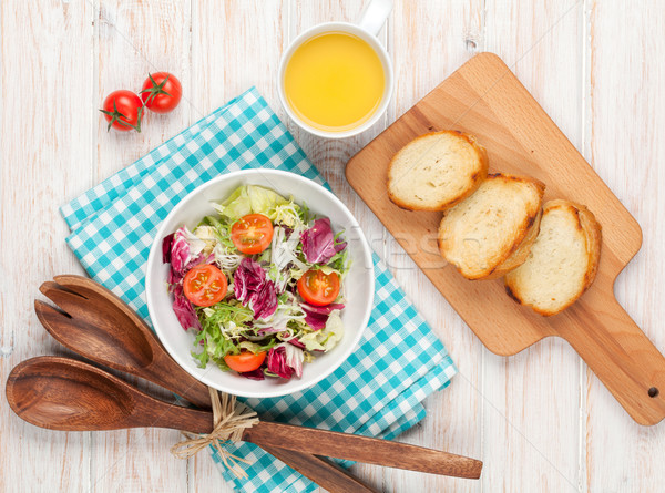 Healthy breakfast with salad, tomatoes and toasts Stock photo © karandaev