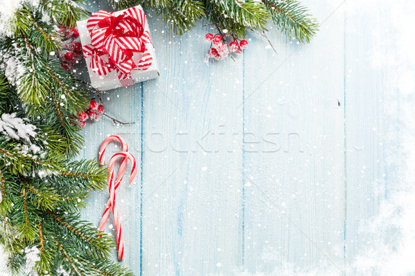 Stock photo: Christmas gift box, candy cane and fir tree