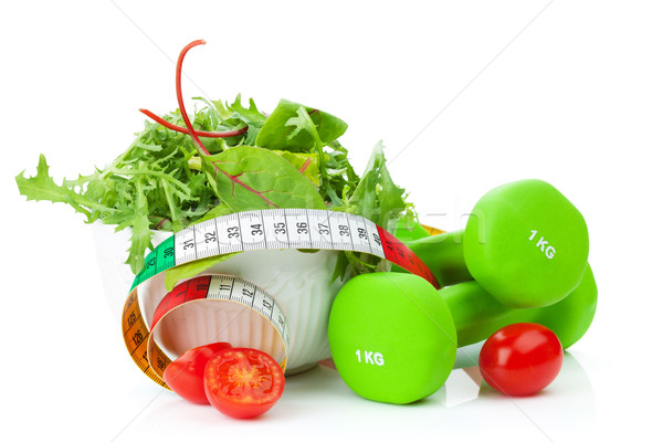 Dumbells, tape measure and healthy food. Fitness and health Stock photo © karandaev