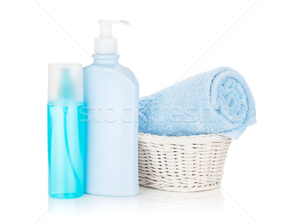 Cosmetics bottles and blue towel Stock photo © karandaev