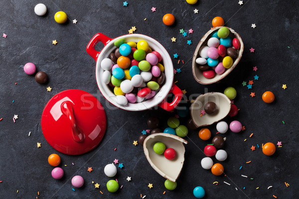 Colorful candies and chocolate egg Stock photo © karandaev