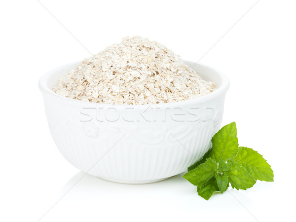 Oat flakes in bowl and mint Stock photo © karandaev