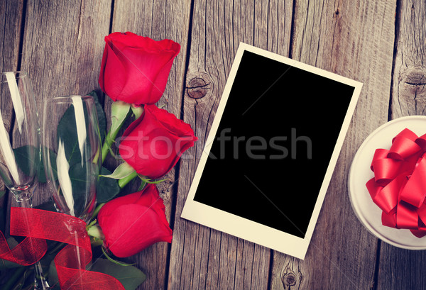 Valentines day photo frame, gift box and red roses Stock photo © karandaev