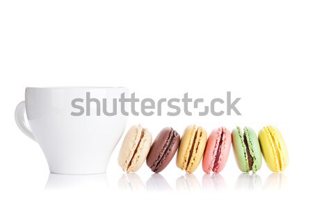 Colorful macaroons and cup of drink Stock photo © karandaev