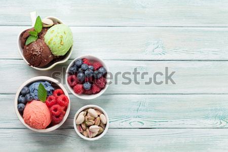 Ice cream with nuts and berries Stock photo © karandaev