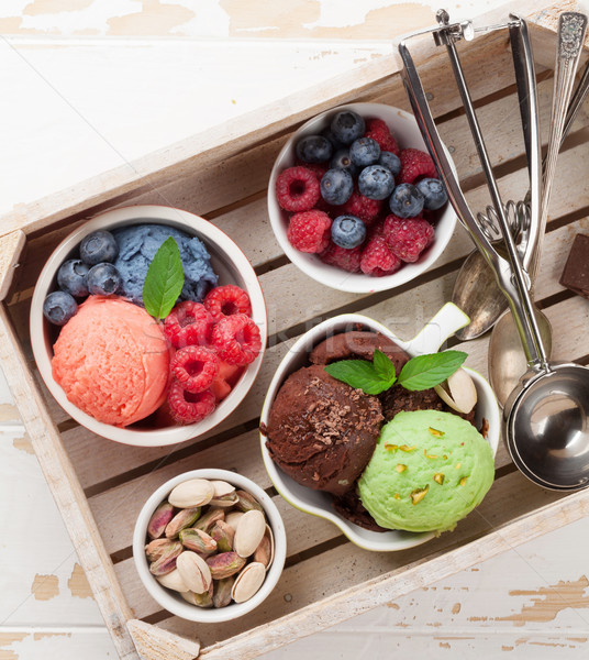 Ice cream with nuts and berries Stock photo © karandaev