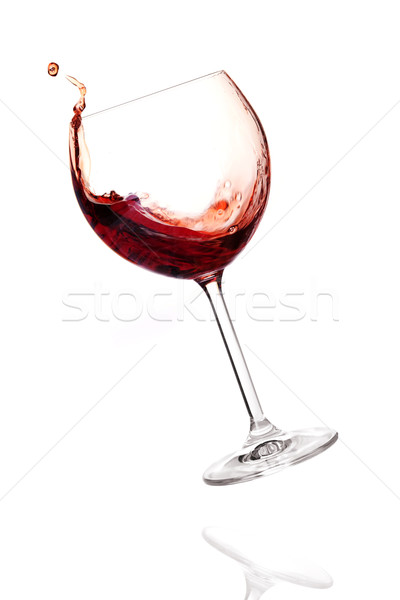 Wine collection - Red wine in falling glass Stock photo © karandaev