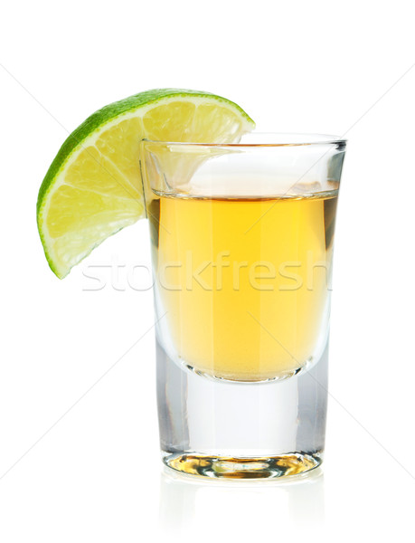 Lövés arany tequila citrus szelet izolált Stock fotó © karandaev
