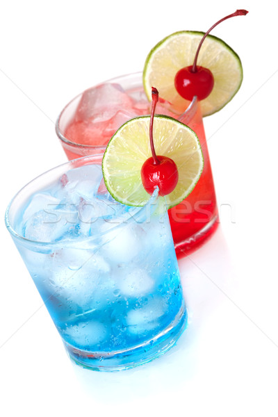 Two cocktails with lime slice and maraschino Stock photo © karandaev
