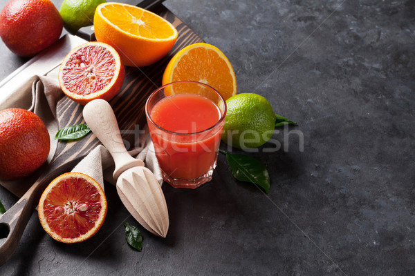 Fresh citruses and juice Stock photo © karandaev