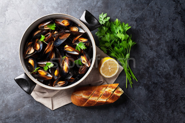 Mussels and bread Stock photo © karandaev