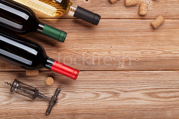 Vin bouteilles table en bois rouge vin blanc haut [[stock_photo]] © karandaev